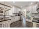 Spacious kitchen features stainless steel appliances, granite countertops and white cabinets at 113 Gold Bridge Xing, Canton, GA 30114