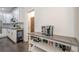 Cozy kitchen area featuring a beverage cooler, stainless steel microwave, and coffee bar at 113 Gold Bridge Xing, Canton, GA 30114