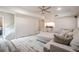 The expansive living room of this home has a comfortable sectional sofa and a nearby staircase at 113 Gold Bridge Xing, Canton, GA 30114