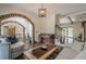 Inviting living room with archways, hardwood floors, and stylish furniture at 113 Gold Bridge Xing, Canton, GA 30114