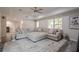 This is a view of the comfortable sectional sofa in the living room of this home at 113 Gold Bridge Xing, Canton, GA 30114
