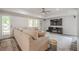 This spacious living room has a ceiling fan, comfortable sectional sofa and large screen television at 113 Gold Bridge Xing, Canton, GA 30114