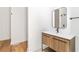 Stylish bathroom boasts a modern vanity with a sleek mirror and contemporary finishes at 1554 Columbia Cir, Decatur, GA 30032