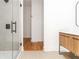 Bright bathroom featuring a modern vanity and a glass-enclosed shower at 1554 Columbia Cir, Decatur, GA 30032