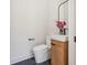 Chic half bathroom featuring a modern vanity, sleek fixtures, and stylish decor at 1554 Columbia Cir, Decatur, GA 30032