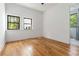 Bedroom featuring natural light from two windows and a view of the bathroom at 1554 Columbia Cir, Decatur, GA 30032