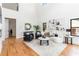 Open-concept living room featuring high ceilings, wood floors, and modern furnishings at 1554 Columbia Cir, Decatur, GA 30032