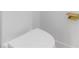 Close-up of a modern toilet with golden paper holder at 1554 Columbia Cir, Decatur, GA 30032
