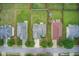 Aerial shot of residential neighborhood with well-maintained lawns and mature trees at 1909 Sawgrass Dr, Hampton, GA 30228