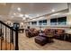 Finished basement with laminate wood flooring, neutral paint, and a pool table at 1984 Mendenhall Cir, Atlanta, GA 30341
