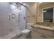 Updated bathroom with glass-enclosed shower and modern vanity at 1984 Mendenhall Cir, Atlanta, GA 30341