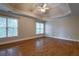 A spacious bedroom boasts hardwood floors, tray ceiling, and large windows for natural light at 1984 Mendenhall Cir, Atlanta, GA 30341
