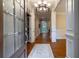 Elegant foyer with hardwood floors, a decorative rug, and detailed molding throughout at 1984 Mendenhall Cir, Atlanta, GA 30341