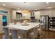 Gourmet kitchen with granite counters, stainless steel appliances, and a center island at 1984 Mendenhall Cir, Atlanta, GA 30341