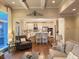 Open concept living area with hardwood floors, island seating, and a well-appointed kitchen at 1984 Mendenhall Cir, Atlanta, GA 30341