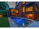 Tranquil backyard pool and spa with screened porch overlooking lush greenery at 1984 Mendenhall Cir, Atlanta, GA 30341