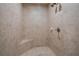 Tiled shower featuring a built-in seat and sleek fixtures at 1984 Mendenhall Cir, Atlanta, GA 30341