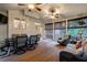 Spacious sunroom featuring neutral decor, wood floors, ceiling fans, and lots of natural light at 1984 Mendenhall Cir, Atlanta, GA 30341