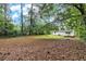 Spacious backyard with mature trees, perfect for outdoor activities and relaxation at 340 Bell Se St, Marietta, GA 30060