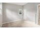 Empty bedroom featuring wall-to-wall carpet and natural light from windows at 340 Bell Se St, Marietta, GA 30060