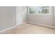 Empty bedroom featuring wall-to-wall carpet and natural light from windows at 340 Bell Se St, Marietta, GA 30060