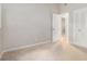 Comfortable bedroom with neutral walls, soft carpeting, a bright window, and a spacious closet for ample storage at 340 Bell Se St, Marietta, GA 30060