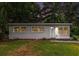 Charming home exterior featuring well-maintained landscaping and welcoming entrance at 340 Bell Se St, Marietta, GA 30060