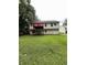 Spacious backyard featuring a deck, offering a perfect outdoor entertaining space at 645 Robin Rd, Covington, GA 30016