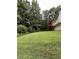 Expansive backyard with lush green grass, providing ample space for outdoor activities and enjoyment at 645 Robin Rd, Covington, GA 30016