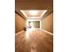 This bedroom features tile flooring, recessed ceiling lights, and multiple doorways at 645 Robin Rd, Covington, GA 30016
