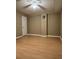 This is a bedroom with a window for ventilation, white trim, and a ceiling fan at 645 Robin Rd, Covington, GA 30016