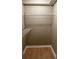 This is a closet with wire racks for storage and wooden floor at 645 Robin Rd, Covington, GA 30016