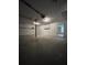 Large garage with storage cabinets, lighting, and easy access to the home's interior at 645 Robin Rd, Covington, GA 30016