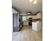 Well-appointed kitchen with white cabinetry, modern appliances, and a functional breakfast bar for casual dining at 645 Robin Rd, Covington, GA 30016