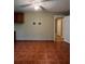Spacious living room featuring tile floors, ceiling fan, and eye-catching decor at 645 Robin Rd, Covington, GA 30016