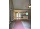 Open-concept living space with seamless flow from the living room to the modern kitchen at 645 Robin Rd, Covington, GA 30016