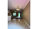 Open living space seamlessly connects to the kitchen, perfect for entertaining and everyday living at 645 Robin Rd, Covington, GA 30016