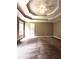 Spacious main bedroom with a tray ceiling, ceiling fan, and neutral carpeting at 645 Robin Rd, Covington, GA 30016