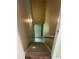 Stairwell view leading down to a finished basement at 645 Robin Rd, Covington, GA 30016
