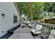 Back deck with an outdoor seating area that provides a relaxing space at 1133 Capital Club Ne Cir, Brookhaven, GA 30319
