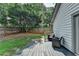 Backyard deck featuring cozy seating, perfect for outdoor relaxation at 1133 Capital Club Ne Cir, Brookhaven, GA 30319