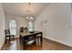 Bright dining room with hardwood floors, modern lighting, and ample natural light at 1133 Capital Club Ne Cir, Brookhaven, GA 30319