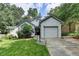 Charming single-story home featuring a well-maintained lawn, attached garage, and inviting curb appeal at 1133 Capital Club Ne Cir, Brookhaven, GA 30319