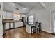 Modern kitchen with white cabinets, stainless steel appliances, and granite countertops at 1133 Capital Club Ne Cir, Brookhaven, GA 30319