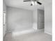 Bedroom featuring plush carpeting, neutral paint, and a closet at 5126 Wellsley Bnd, Alpharetta, GA 30005