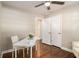 A bedroom with hardwood floors and a ceiling fan at 863 Needle Rock Dr, Stonecrest, GA 30083