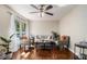 Cozy living area with stylish furniture and a large window at 863 Needle Rock Dr, Stonecrest, GA 30083