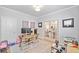 Bright home office with hardwood floors, natural light and modern decor at 306 Coppergate Ct, Holly Springs, GA 30115