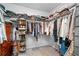 Spacious walk-in closet with built-in shelving and ample storage space at 306 Coppergate Ct, Holly Springs, GA 30115