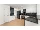 Beautiful kitchen featuring stainless steel appliances, marble backsplash, and white cabinets at 3878 Brookside Pkwy, Decatur, GA 30034